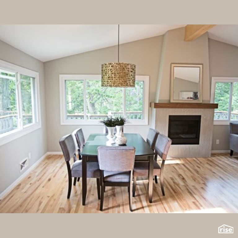 Dining Room with Gas Fireplace by Constructive Builders
