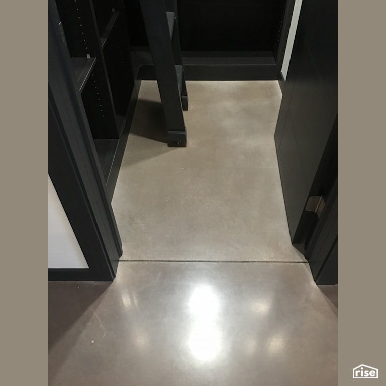 800 Grit cream polish with grey dye with Concrete Flooring by DeltaCrete