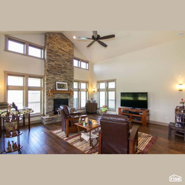 Living Room with Fixed Window by Winsome Construction