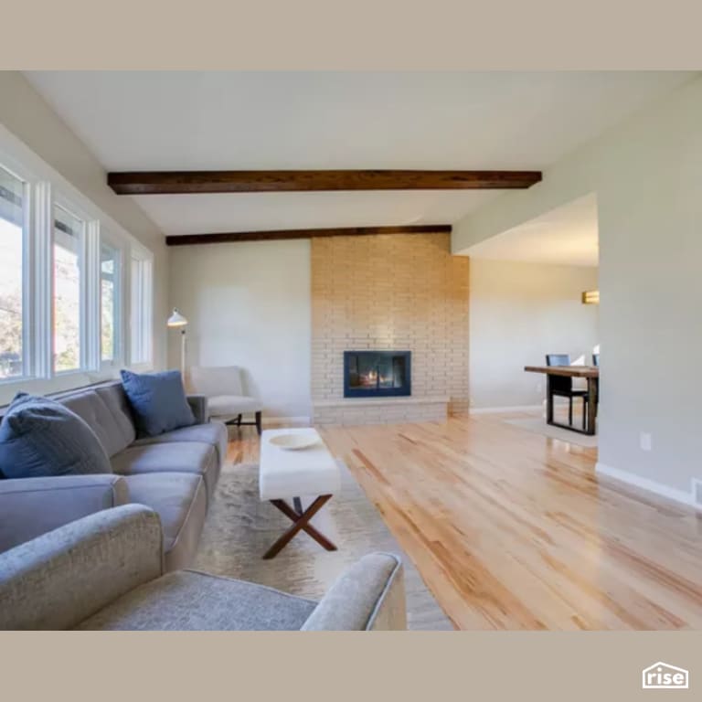 Living Room with Gas Fireplace by Constructive Builders