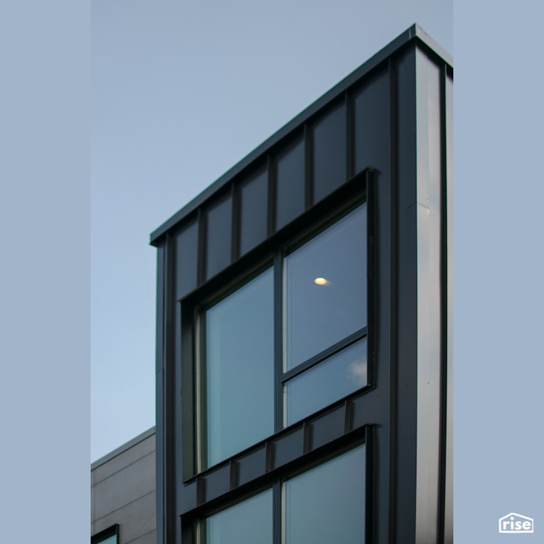 Front exterior triple glazed window with Aluminum Siding by Alpen High Performance Products