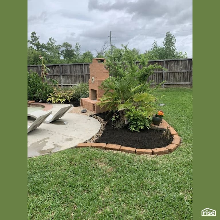Compressed earth block fireplace and landscaping with Compressed Earth Blocks by TexaTerra Block