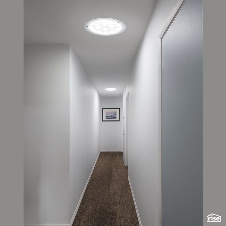 Skylight in Long Hallway with Tubular Skylight by Solatube International, Inc.