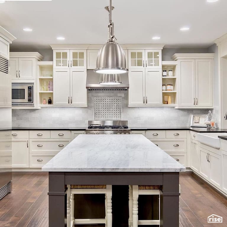 Bright white kitchen with finished hardwood floors with Interior Wood Finish by Vermont Natural Coatings