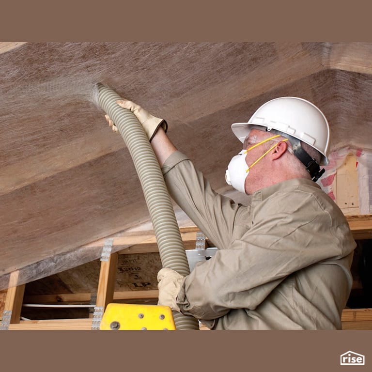 Cellulose blown-in insulation in attic with Cellulose Blown-in Insulation by Greenfiber