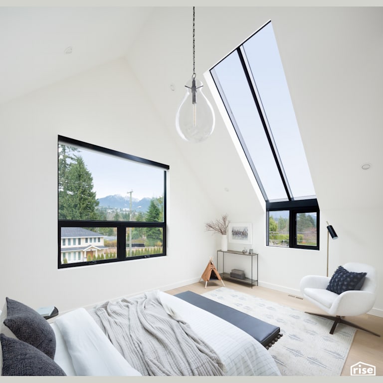 Loft Style Bedroom With Large Skylight with Triple Pane Window by Synthesis Design