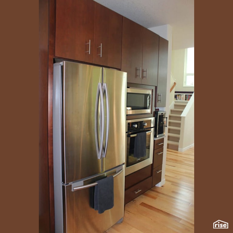 Kitchen with Wall Oven by Winsome Construction