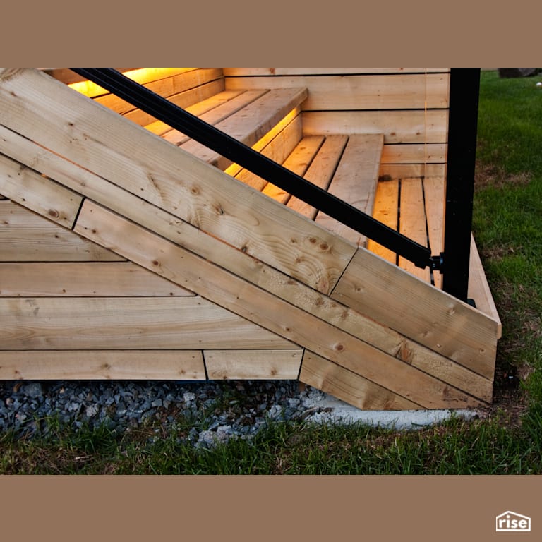 Base of the stairs with Cedar Decking by RSI Projects