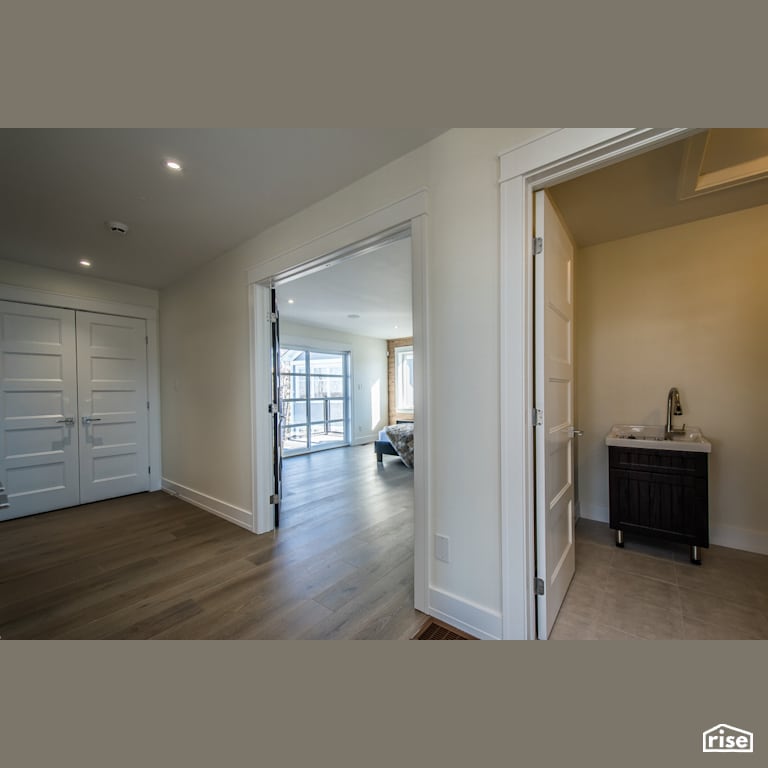 The Tempranillo - Hallway with Energy Star Exterior Door by Bowers Construction