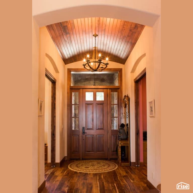 Entryway with Solid Wood Door by Winsome Construction