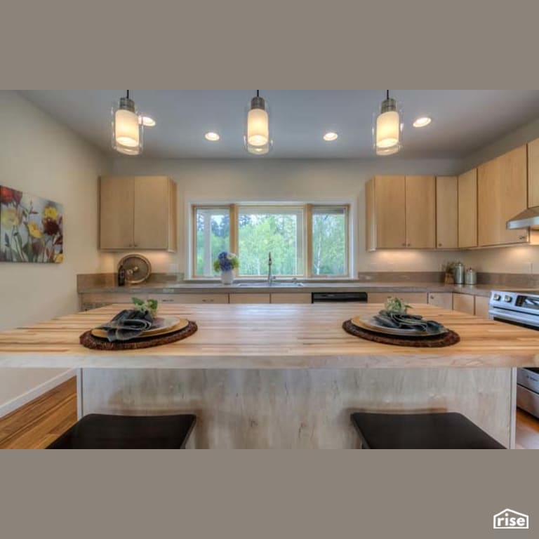 Kitchen with Induction Range by Winsome Construction