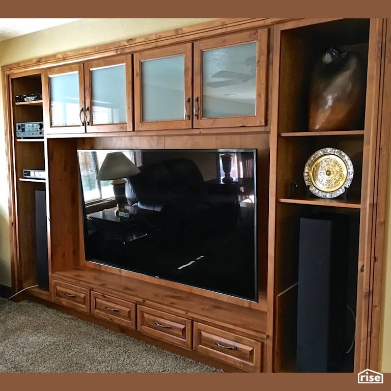 Custom entertainment console with Television by Revolve Design Build
