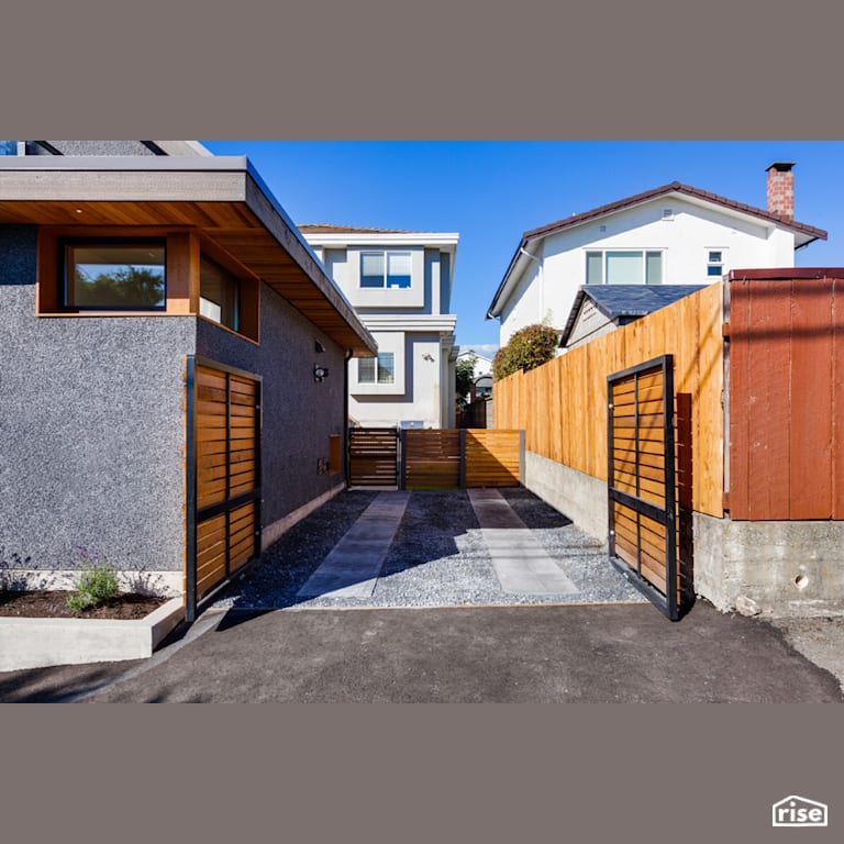 Newport House Gated Driveway with Fixed Window by Lanefab Design/Build