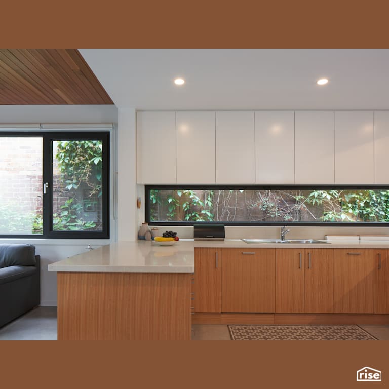 Kitchen with Triple Pane Window by Lanefab Design/Build