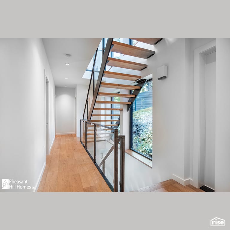 Staircase with Integrated LED by Pheasant Hill Homes Ltd.