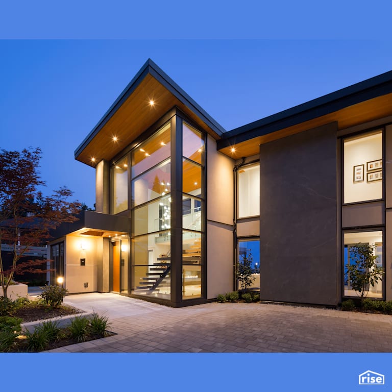 Exterior with Accent Outdoor Lighting by Naikoon Contracting