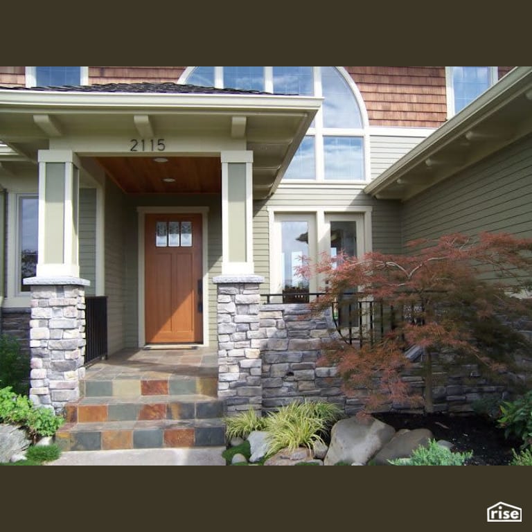 Home Exterior Entrace with Solid Wood Door by Winsome Construction