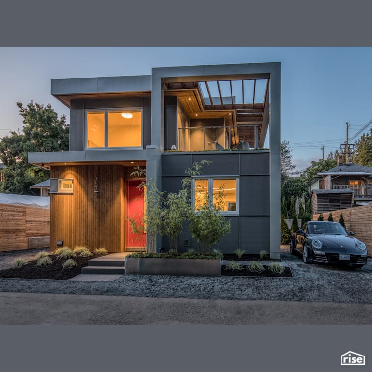 MODCUBE - Front of House with Clapboard Wood Siding by Synthesis Design