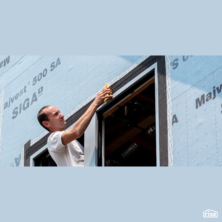 Applying SIGA exterior air sealing tape with Vapor Control Layer by SIGA North America