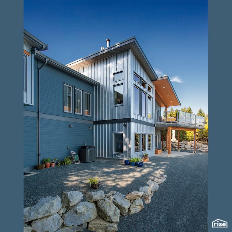 Saltair Seascape - Exterior with Accent Outdoor Lighting by Pheasant Hill Homes Ltd.
