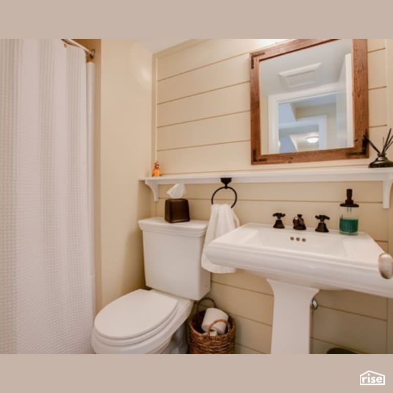 Clapboard Bathroom with Dual Flush Toilet by Constructive Builders