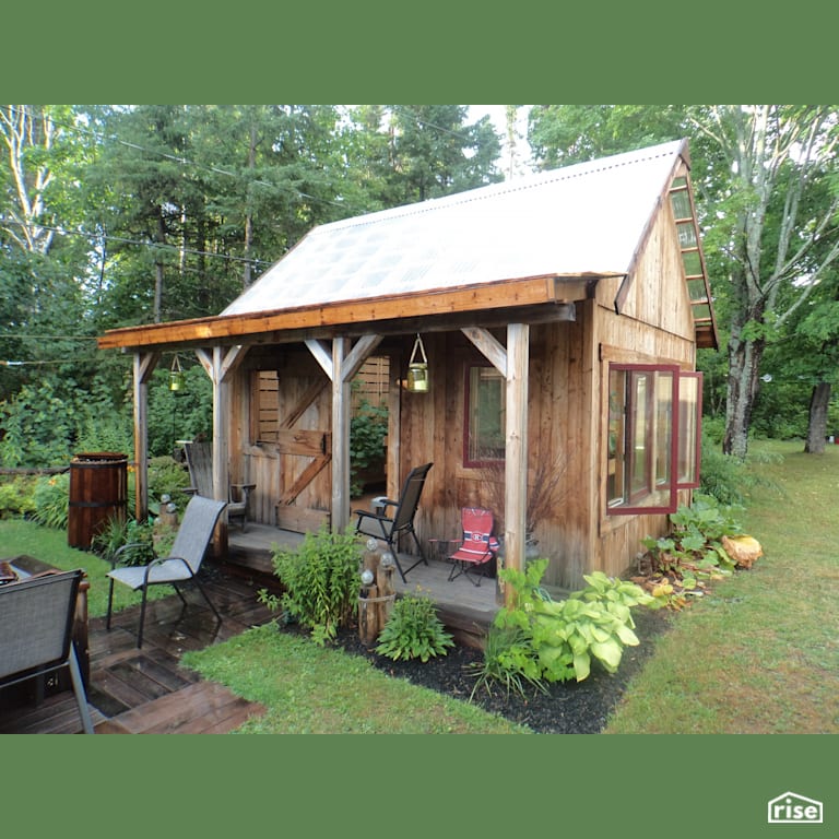 Front View of Thermally Modified Weatherwood Greenhouse with Thermally Modified Wood Siding by Thermalwood Canada