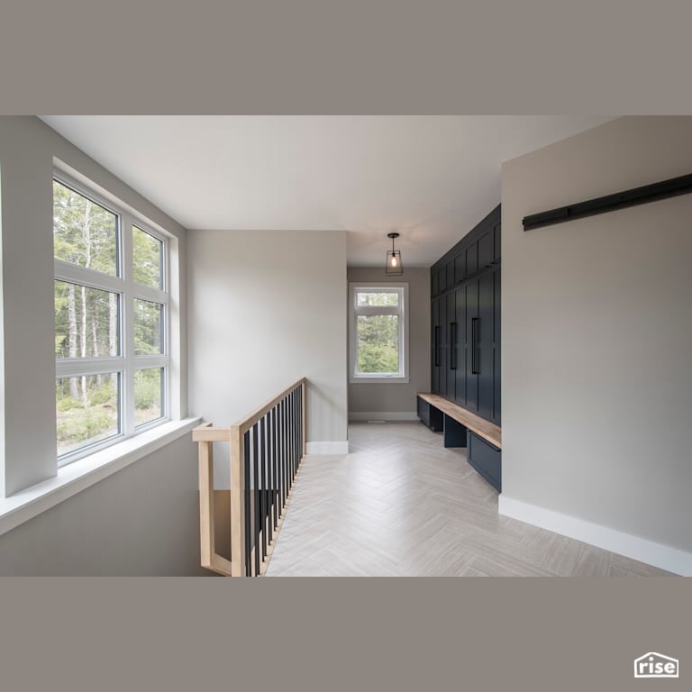 Bridge Over Water - Staircase with Ceiling Light by Homes by Highgate