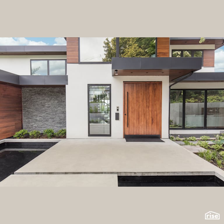 Entryway with Concrete Stairs with Triple Pane Window by Synthesis Design