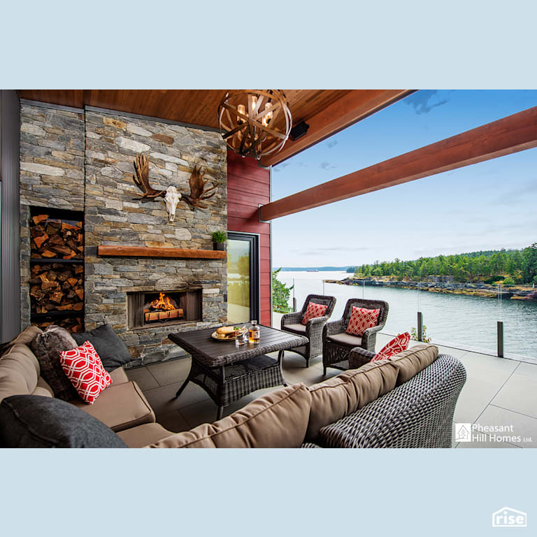 Deck with Accent Outdoor Lighting by Pheasant Hill Homes Ltd.