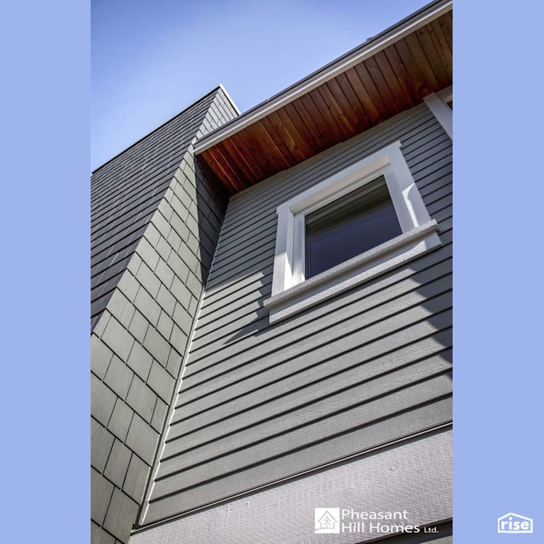 Exterior Window with Triple Pane Window by Pheasant Hill Homes Ltd.