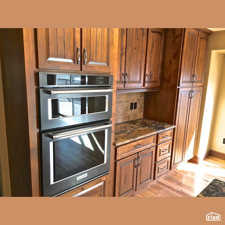 Solid wood kitchen cabinets with FSC Certified Wood Cabinet by Revolve Design Build