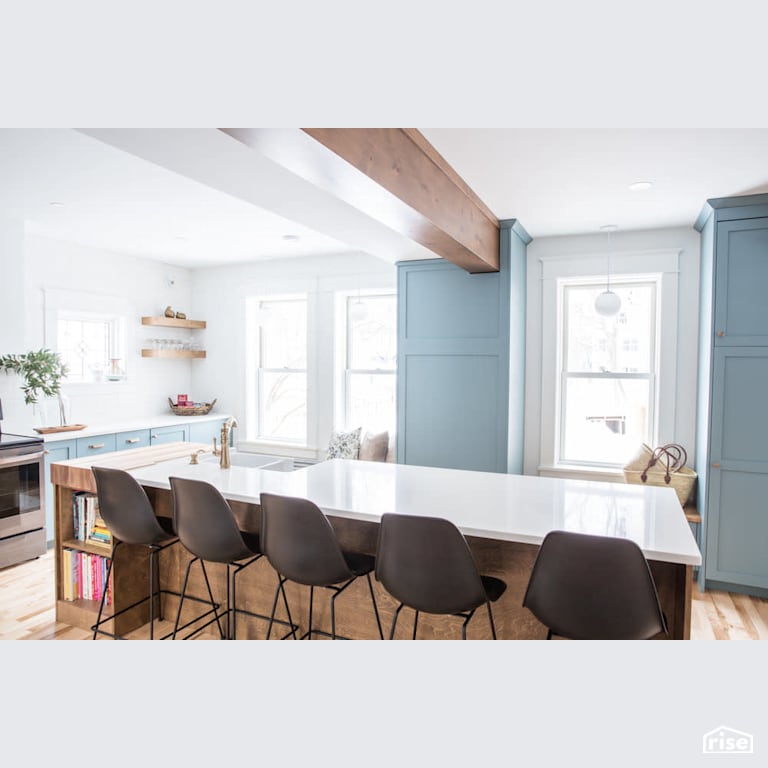 Kitchen island with natural light with Low-Flow Kitchen Faucet by Reimagine Designs