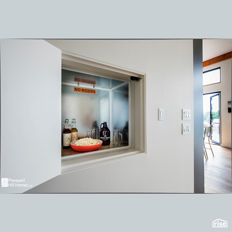 Dumbwaiter with Dimmer Switch by Pheasant Hill Homes Ltd.
