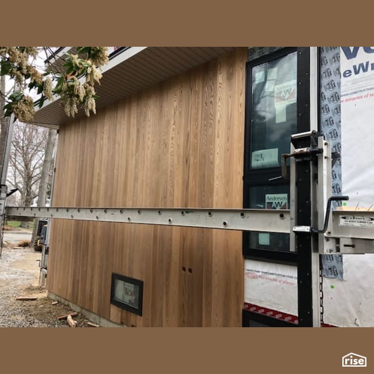 Americana Ash Thermally Modified Siding With Window Being Installed with Thermally Modified Wood Siding by Americana by Bingaman