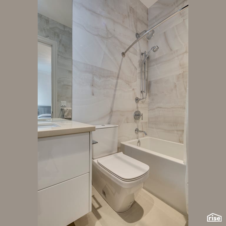 Executive Elegance - Bathroom with Low-Flow Showerhead by Clay Construction