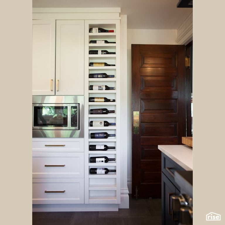 Integrated kitchen wine rack with Wall Oven by J Russon Construction