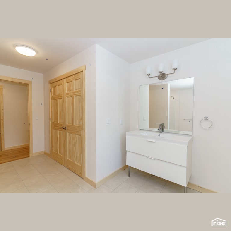 Interior_Unit1 Bathroom Sink-view with Ceramic Tile Floors by Tooketree Passive Homes