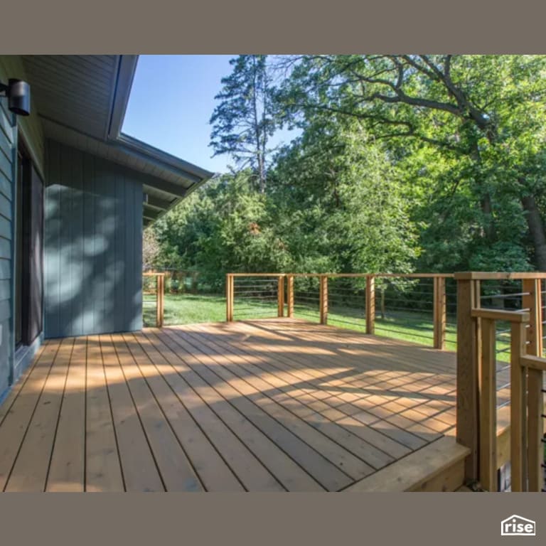 Back Deck with Shiplap Wood Siding by Constructive Builders