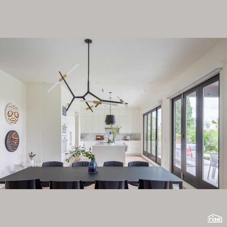 Kitchen View from Dining Area with Tilt-and-Turn Patio Door by Synthesis Design