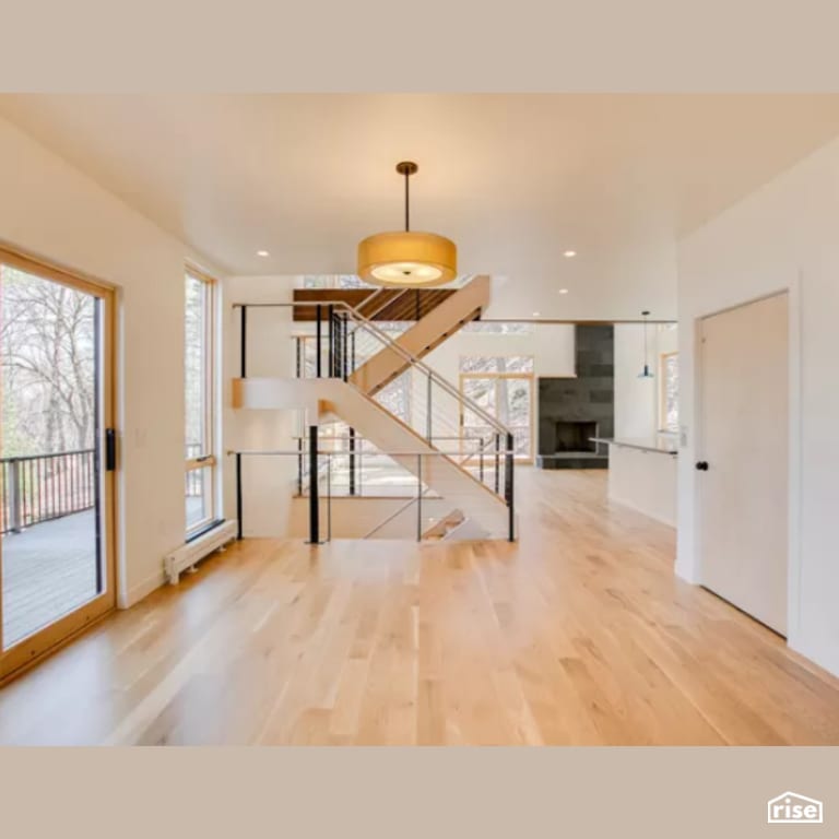 Living Room and Staircase with Integrated LED by Constructive Builders