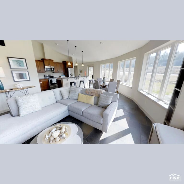 Open concept roundhouse living room with Integrated LED by Deltec Homes