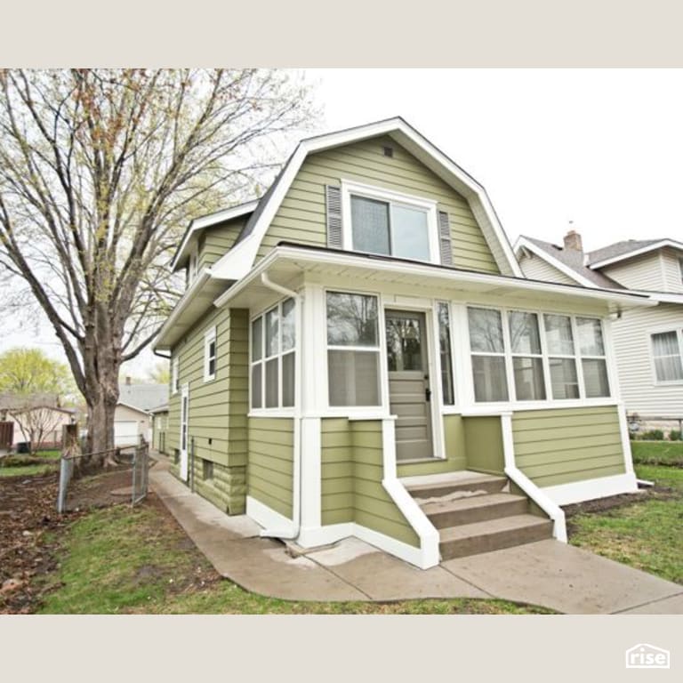 Home Remodel with Clapboard Wood Siding by Constructive Builders