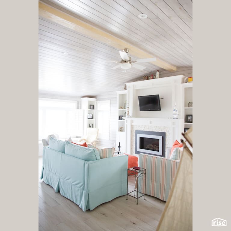 Living Room with Shiplap Wood Siding by Osez Interiors