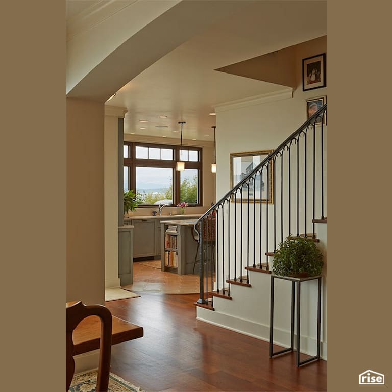 Staircase leading to kitchen with water view with Low-Flow Kitchen Faucet by Gant Nychay Architecture PLLC