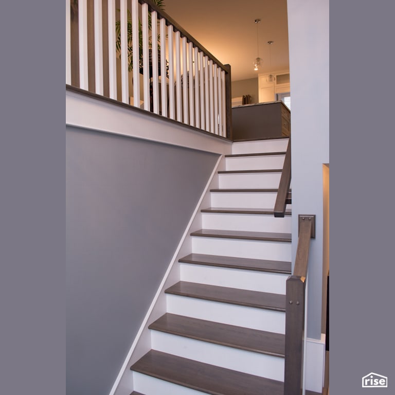 The Carolina - Staircase with Ceiling Light by Justin Bowers Homes