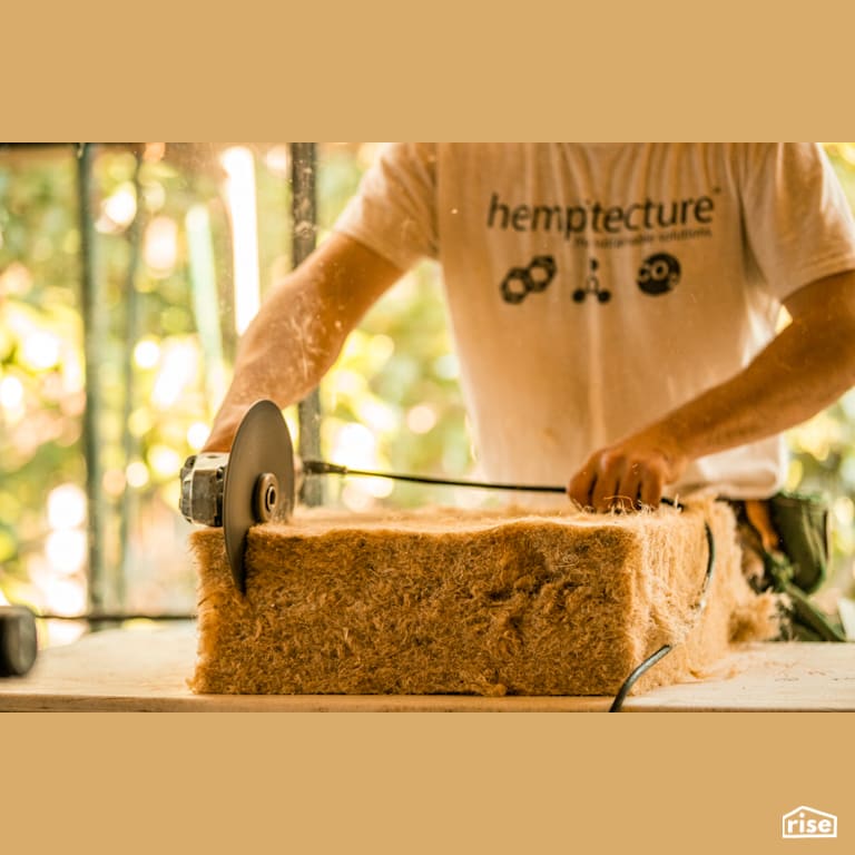 Cutting a Thick HempWool Insulation Batt with Hemp Batt Insulation by Hempitecture