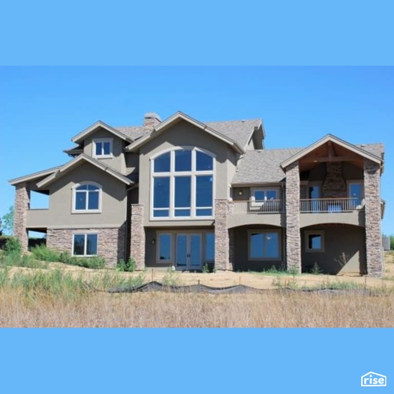 Custom home exterior with Fixed Window by Constructive Builders