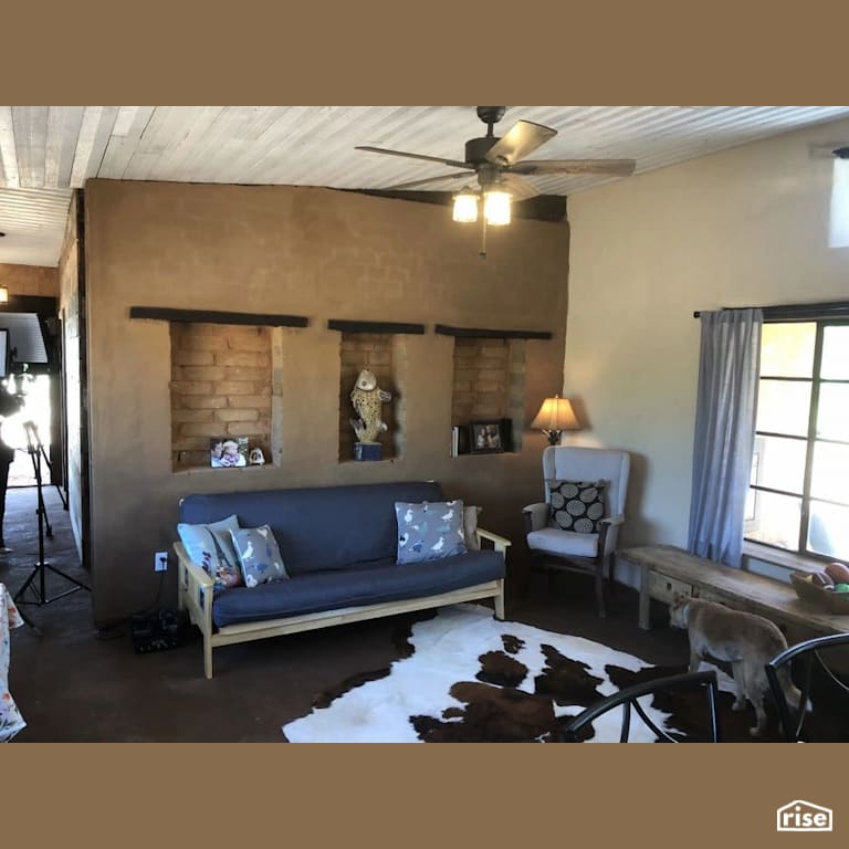 Compressed earth block home living room with Electrical Outlet by TexaTerra Block