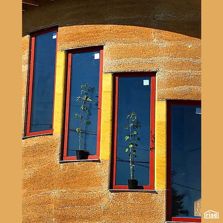 Highland Hemp House Staircase View From Exterior with Hempcrete Walls by Hempitecture