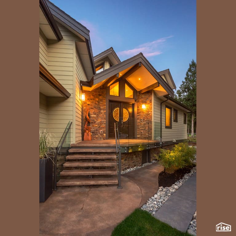Front Entrance with Accent Outdoor Lighting by My House Design/Build Team Ltd.